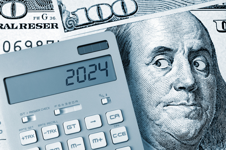 2024. Benjamin Franklin Looking Calculator On One Hundred Dollar Bill.