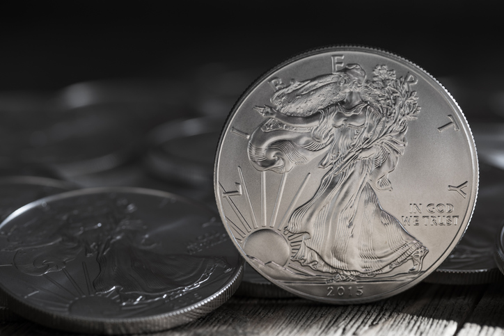 A Stock Photo Of Some 1 Ounce Silver Eagle Coins. The Silver Eagle Coin Is Struck Only As One-troy Ounce, Which Has A Nominal Face Value Of One Dollar And Is Guaranteed To Contain One Troy Ounce Of 99.9% Pure Silver.