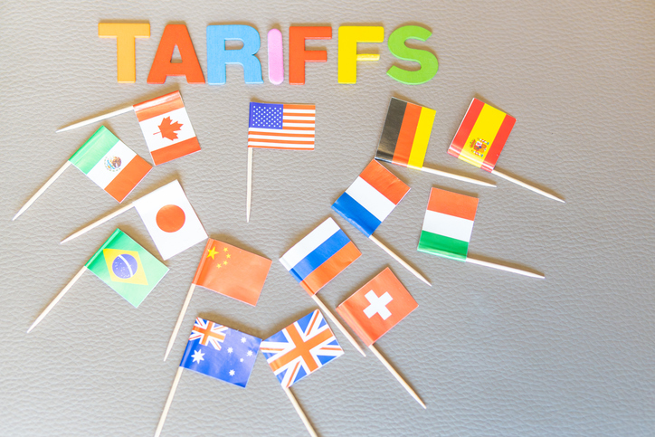 U.S. Tariff Trade War Policy Backfires. Symbol Several Countries Fight Back With Tariffs. Word (TARIFFS) Written. Copy Space On Textured Background. Horizontal Photo. Trump Game