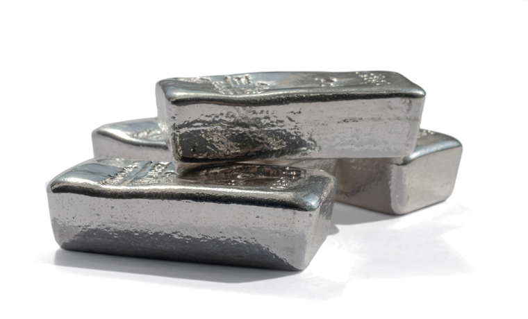 Several Cast Ingots Of Pgm Metals Isolated On White Background.
