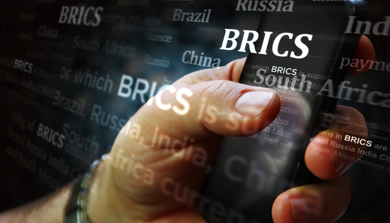 BRICS Economic Group And Union Organization Social Media On Display. Searching On Tablet, Pad, Phone Or Smartphone Screen In Hand. Abstract Concept Of News Titles 3d Illustration.